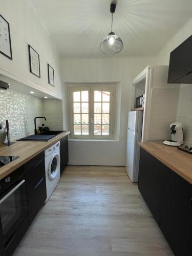 Kuchyňa alebo kuchynka v ubytovaní T1 Bis élégant - Coeur de ville