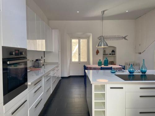 Kuchyň nebo kuchyňský kout v ubytování Holiday Home Casa Nel Blu by Interhome