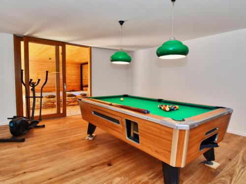 a room with a pool table in a room at Holiday Home Villa Baraka by Interhome in Božava