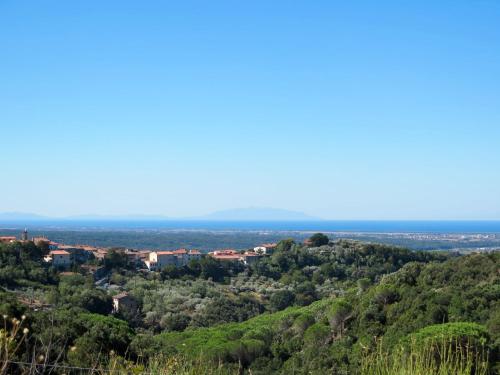 a view of the city from the hills at Apartment Francesco's pretty house by Interhome in Riparbella
