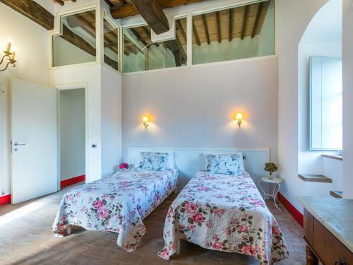 a bedroom with two beds in a room at Holiday Home La Torre-4 by Interhome in Stigliano