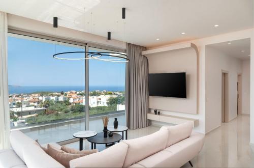 TV a/nebo společenská místnost v ubytování Seaview Lux by PosarelliVillas