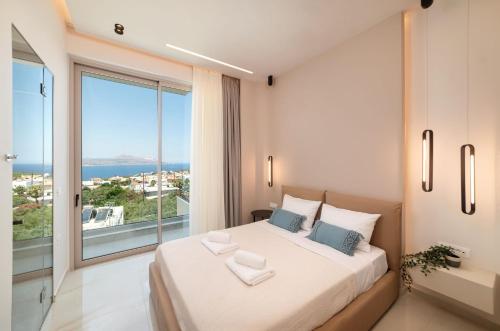 Katil atau katil-katil dalam bilik di Seaview Lux by PosarelliVillas