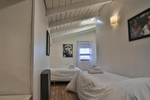 Voodi või voodid majutusasutuse Green House Bariloche toas