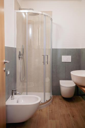 a bathroom with a shower and a sink and a toilet at N'incanto in Rutigliano