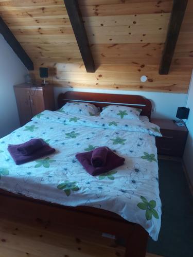 Ένα ή περισσότερα κρεβάτια σε δωμάτιο στο Apartmani Popovic Lux