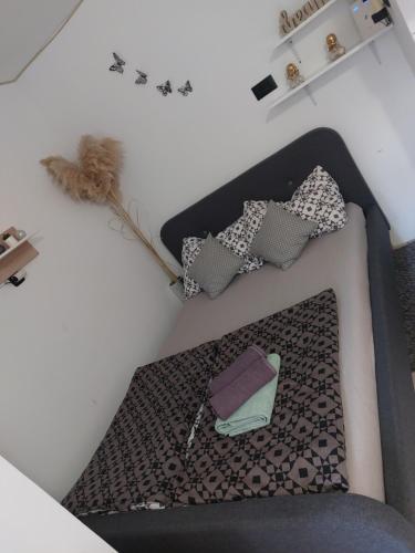 Postel nebo postele na pokoji v ubytování Studio KID