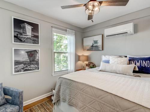 a bedroom with a bed and a ceiling fan at 7 Seas Unit 4 in Tybee Island