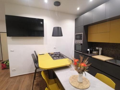 A cozinha ou cozinha compacta de 0541 Guest House Rimini
