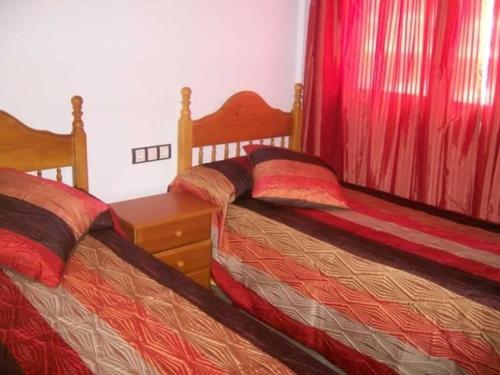 Postel nebo postele na pokoji v ubytování Apartamentos Albamar II