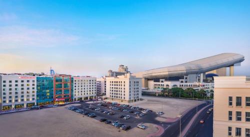 an aerial view of a parking lot in a city at Hilton Garden Inn Dubai Mall Of The Emirates in Dubai