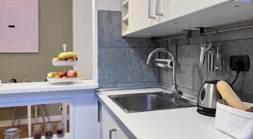 Cuina o zona de cuina de NTB Roma B&B