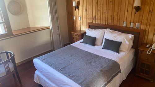 Hotel Costanera - Caja Los Andesにあるベッド