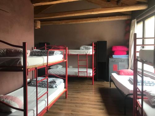 Postel nebo postele na pokoji v ubytování Albergue Gabino