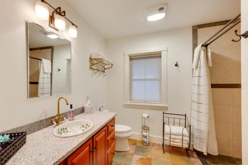 a bathroom with a sink and a toilet and a shower at Hardwick Family Home on VAST Snowmobile Trail in Hardwick