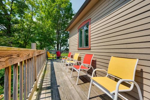 a row of chairs sitting on a deck at On-Site VAST Hiking Trail Hardwick Farmhouse! in Hardwick