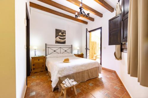 Postel nebo postele na pokoji v ubytování Casa del Molino