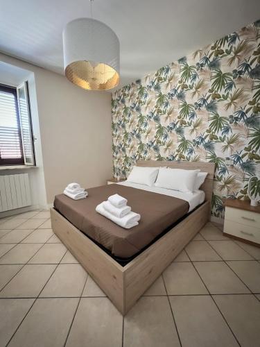 Кровать или кровати в номере B&B La Rosa
