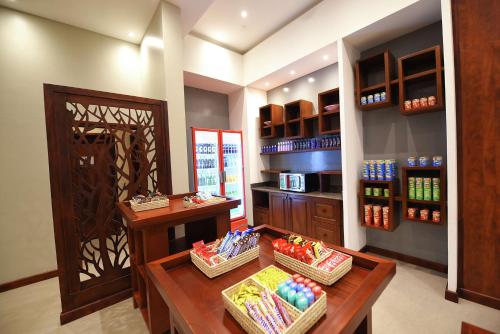 a room with a table and baskets of food at Hilton Garden Inn Kampala in Kampala