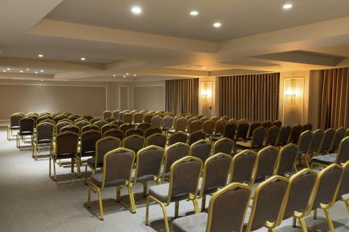 an empty conference room with chairs in it at DoubleTree By Hilton Izmir Airport in Izmir