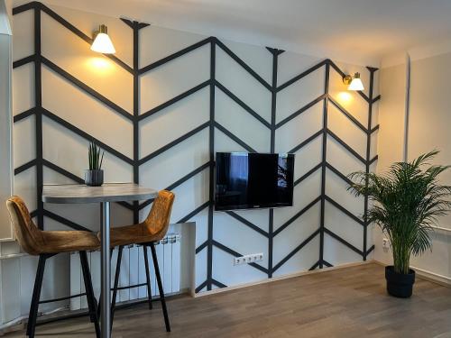 TV a/nebo společenská místnost v ubytování ARKA Apartment Pärnu mnt