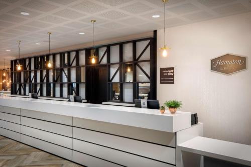 a reception counter in a dental office at Hampton By Hilton Bristol Airport in Redhill