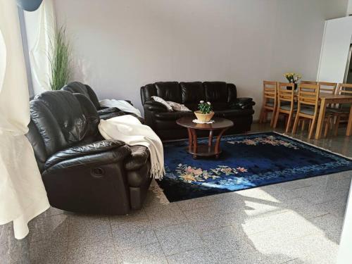 Ein Sitzbereich in der Unterkunft Joensuu Villa Cuisine