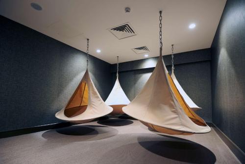 a room with three ping pong balls on display at Hilton Southampton - Utilita Bowl in Southampton