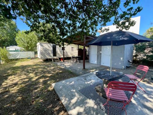 Κήπος έξω από το Bungalow à la plage