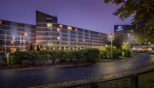 a large building with a street in front of it at Hilton Birmingham Metropole Hotel in Bickenhill