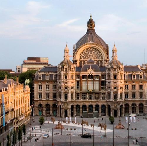 a large building with a large plaza in front of it at Radisson Blu Hotel, Antwerp City Centre in Antwerp