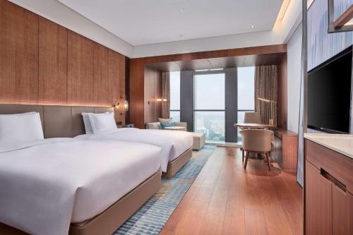 TV o dispositivi per l'intrattenimento presso Hilton Chongqing Liangjiang New Area