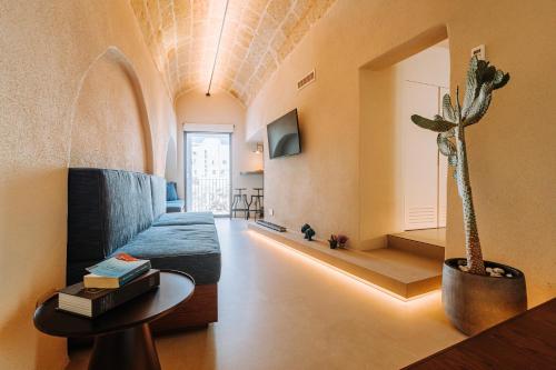 Tre Archi Suite & Relaisにあるテレビまたはエンターテインメントセンター