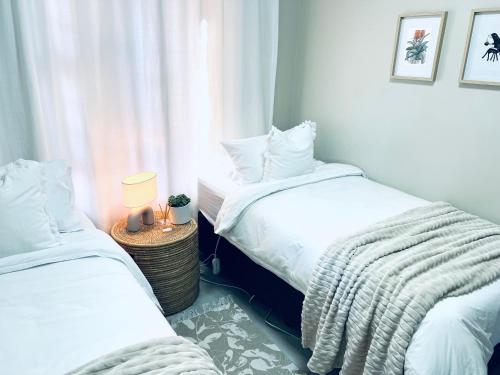 Ένα ή περισσότερα κρεβάτια σε δωμάτιο στο Homey Apartment near Walmer
