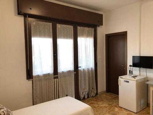Una cama o camas en una habitación de Le Terrazze