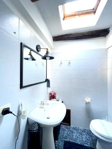Un baño de Casa Veronica - accogliente casa su due piani nel cuore del borgo