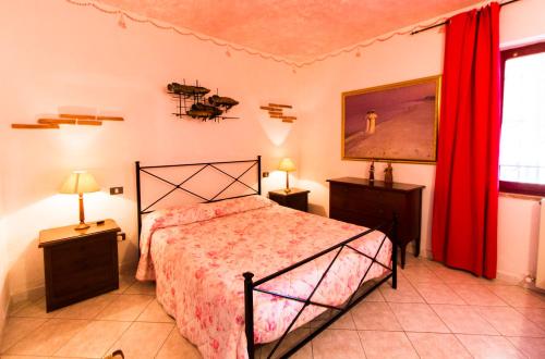 Un ou plusieurs lits dans un hébergement de l'établissement Residence Oasis
