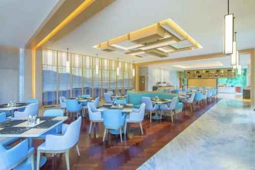 Restoran atau tempat lain untuk makan di Hilton Garden Inn Qidong