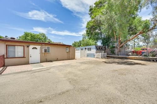 a house with a driveway and a garage at Low-Key Poway Home about 20 Mi to La Jolla and San Diego in Poway