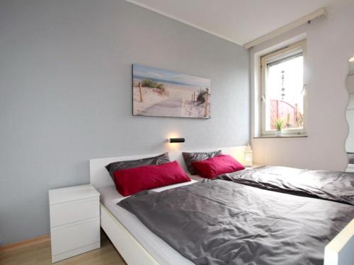 Postel nebo postele na pokoji v ubytování Bungalow, Dornumersiel