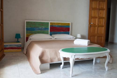 Ein Bett oder Betten in einem Zimmer der Unterkunft Lisca Bianca Tropea
