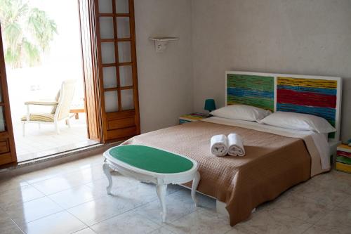 Ein Bett oder Betten in einem Zimmer der Unterkunft Lisca Bianca Tropea