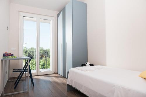 Cama o camas de una habitación en Borgo Fe'