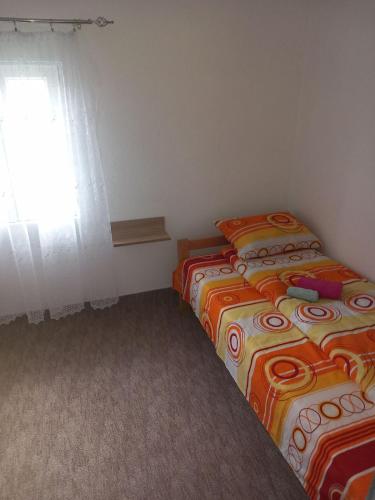 Postel nebo postele na pokoji v ubytování Ivana