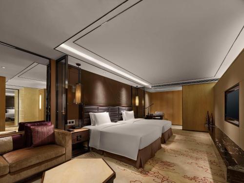 Χώρος καθιστικού στο Hilton Zhongshan Downtown