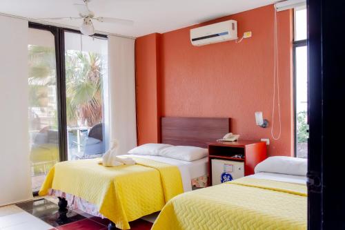 Postel nebo postele na pokoji v ubytování Hostal Antares
