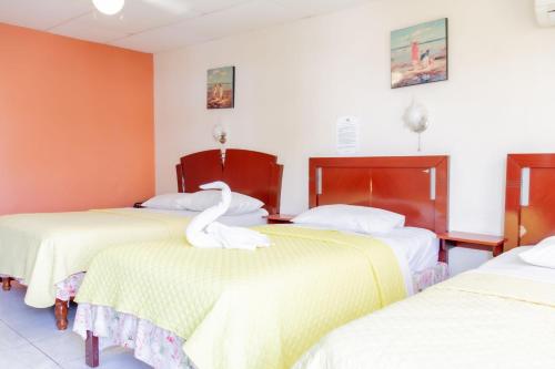 Postel nebo postele na pokoji v ubytování Hostal Antares