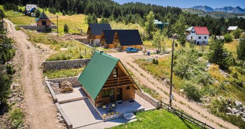an overhead view of a house with a green roof at MoMa Escape in Borje