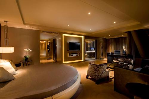 Télévision ou salle de divertissement dans l'établissement Hilton Beijing Wangfujing