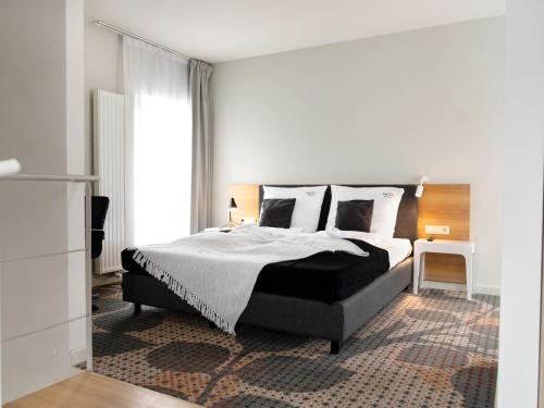 מיטה או מיטות בחדר ב-Duplex, spacious holiday apartment, summer swimming pool, Pogorzelica